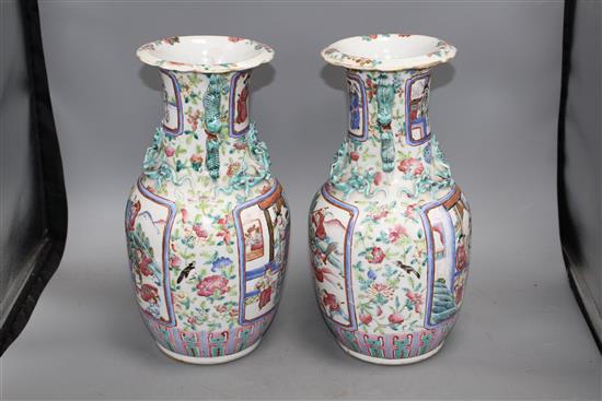 A pair of 19th century Chinese enamelled porcelain vases, height 34cm